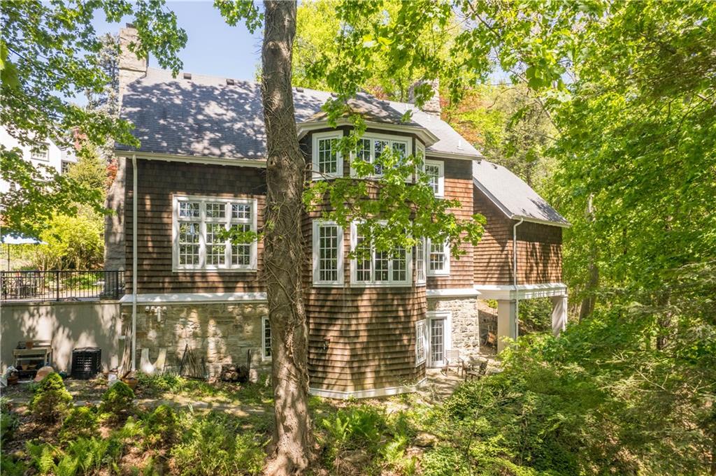 739 Chestnut Road Sewickley, PA 15143 - Photo 4 of 45 Built on the foundation of an artists studio, it fits in with the landscape.