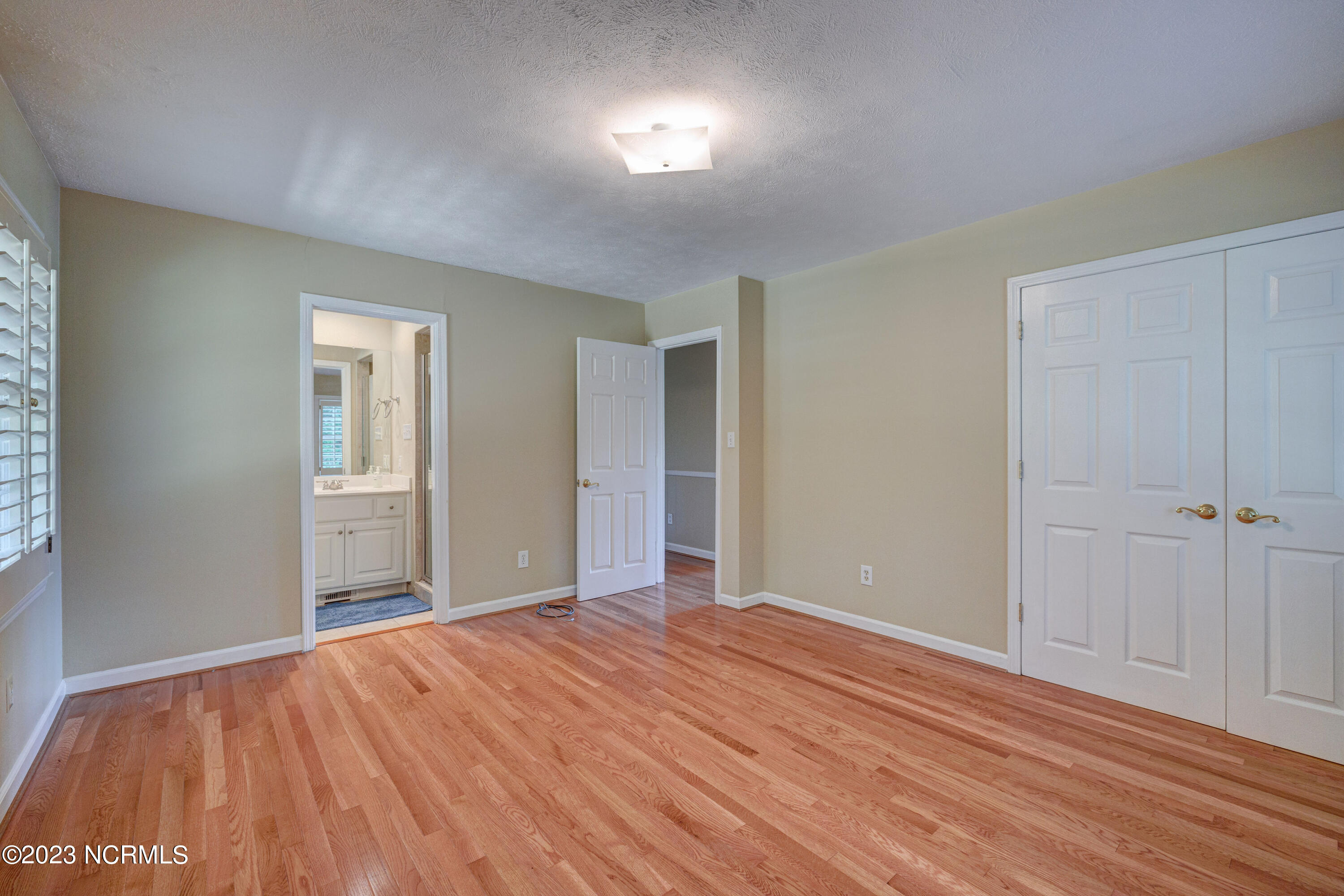 660 Bowen Road Harrells, NC 28444 - Photo 20 of 32 master bedroom features double door closets and private bath