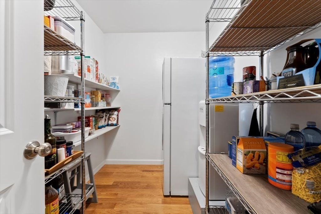 145 Barrington Drive Springfield, MA 01129 - Photo 20 of 42 a view of walk in closet with clothes and shoes