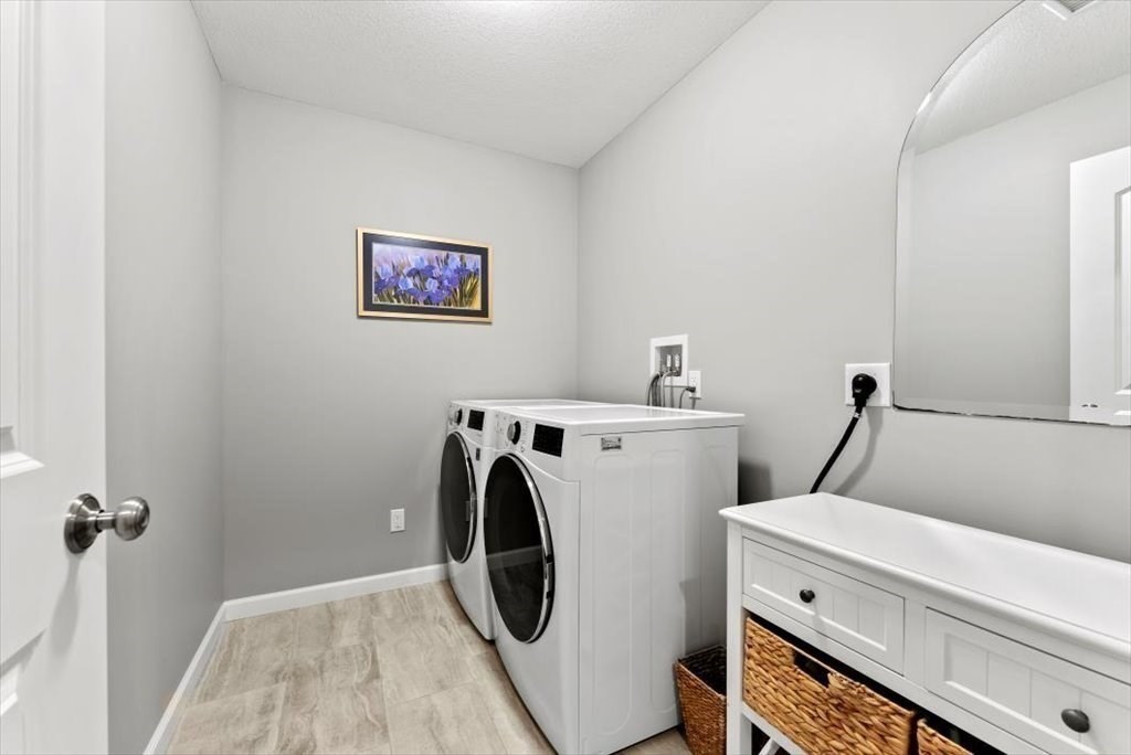 145 Barrington Drive Springfield, MA 01129 - Photo 29 of 42 a utility room with dryer and washer