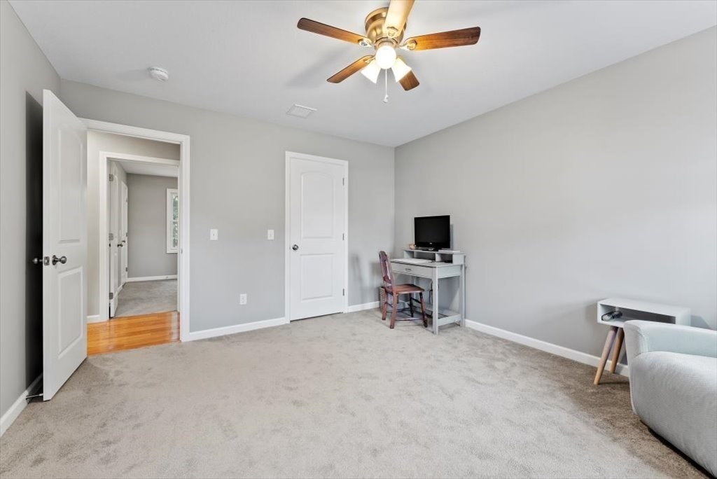 145 Barrington Drive Springfield, MA 01129 - Photo 33 of 42 a view of a livingroom with a flat screen tv