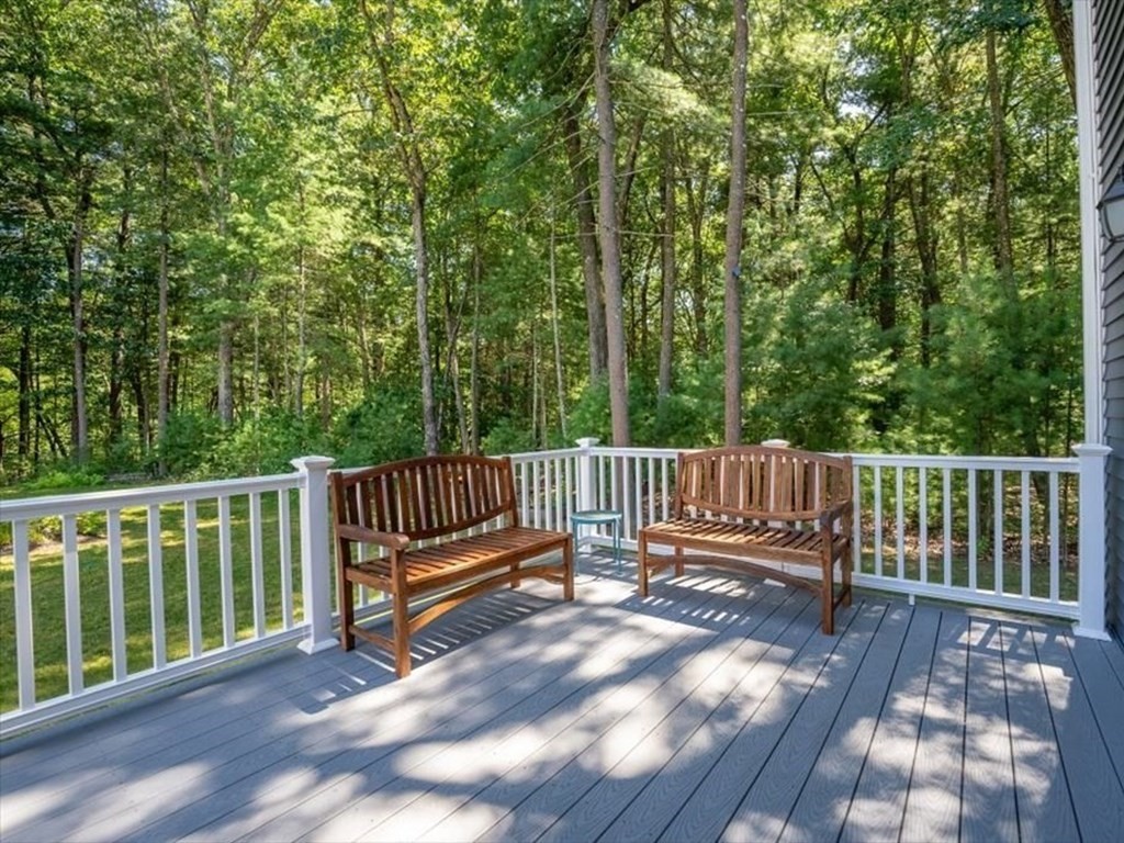 145 Barrington Drive Springfield, MA 01129 - Photo 37 of 42 a view of a wooden deck with a large window