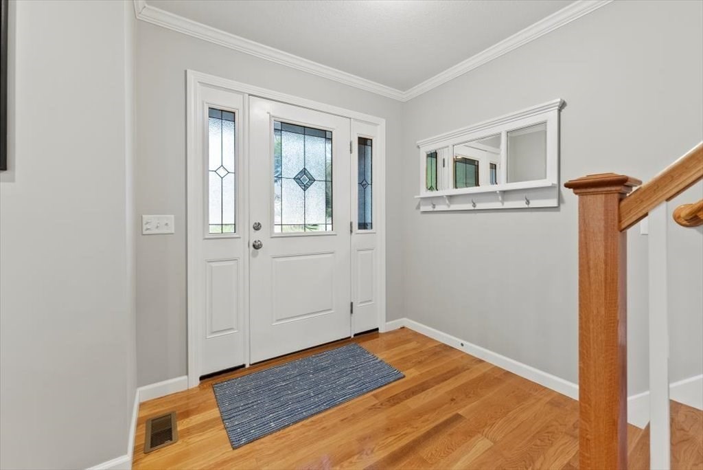 145 Barrington Drive Springfield, MA 01129 - Photo 5 of 42 a view of a livingroom with wooden floor and a window