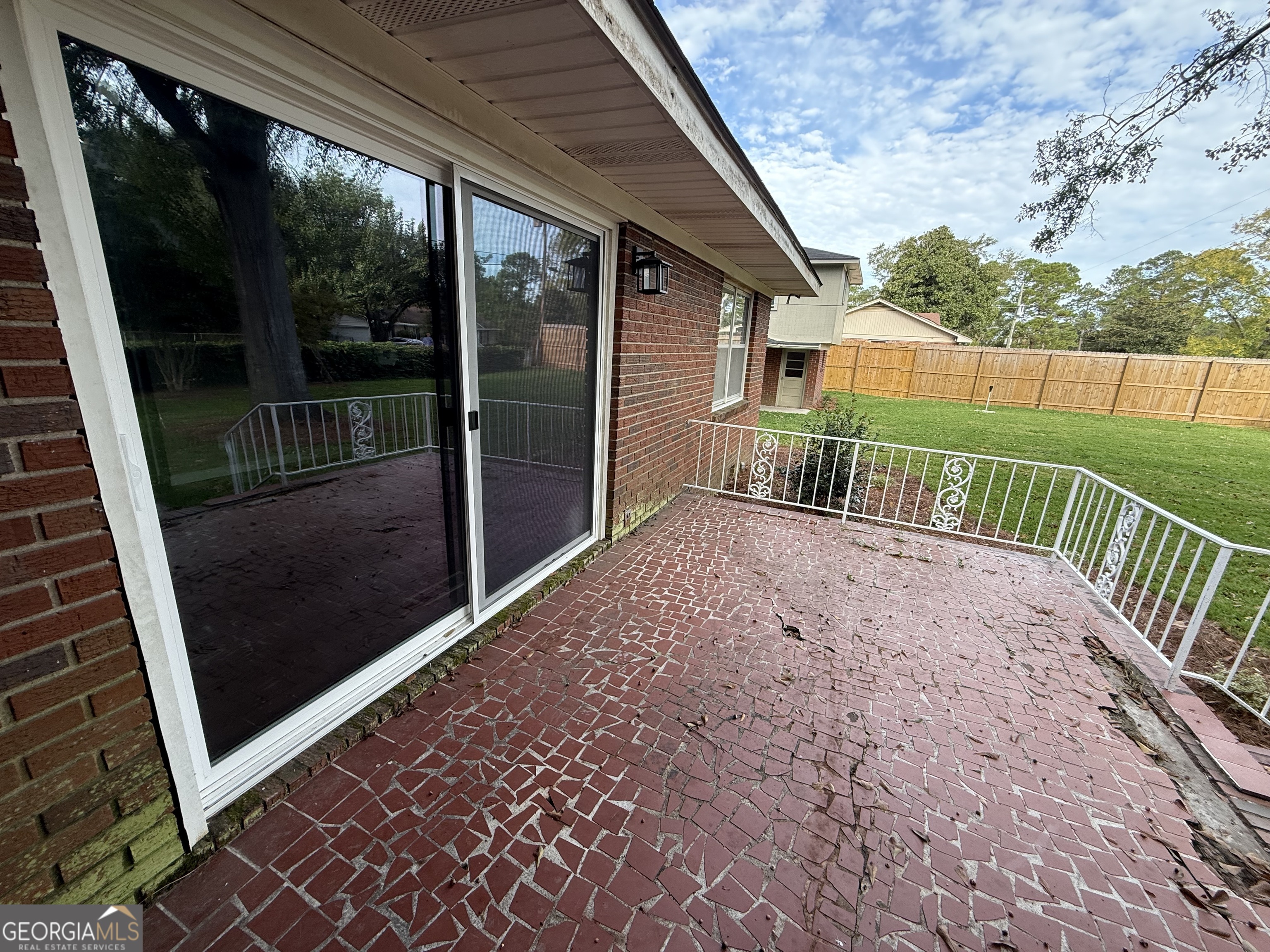 412 Roberson Street Dublin, GA 31021 - Photo 10 of 67 a view of a porch with a yard