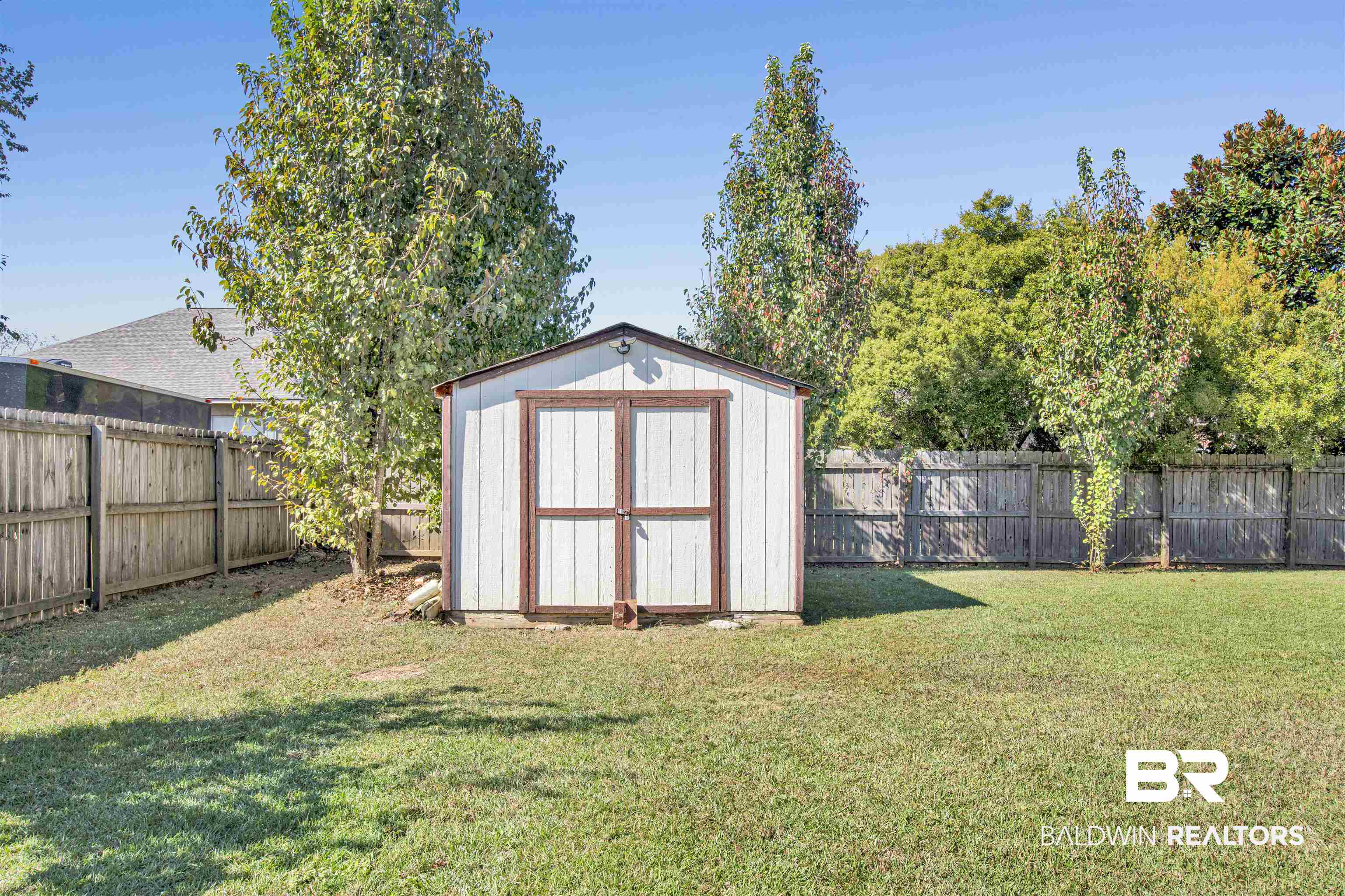 24159 Tullamore Drive Daphne, AL 36526 - Photo 29 of 31 View of outbuilding featuring a lawn