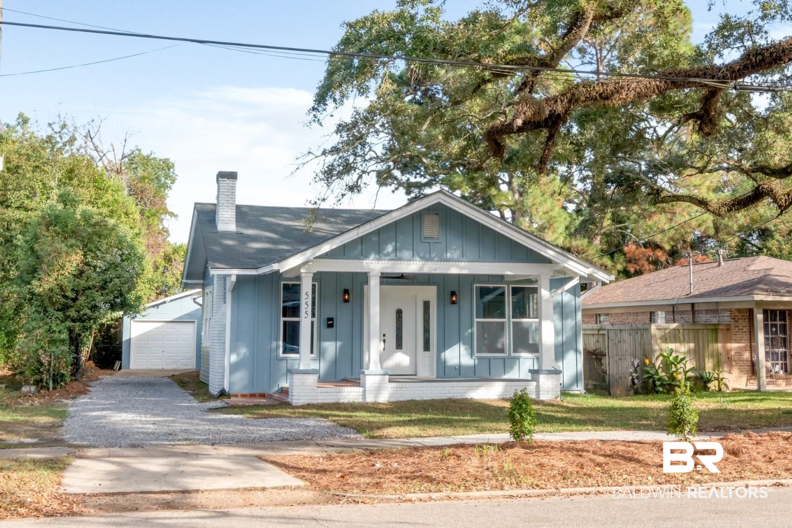 555 Michigan Avenue Mobile, AL 36604 - Photo 26 of 28 Bungalow-style home featuring an outbuilding, a garage, and covered porch