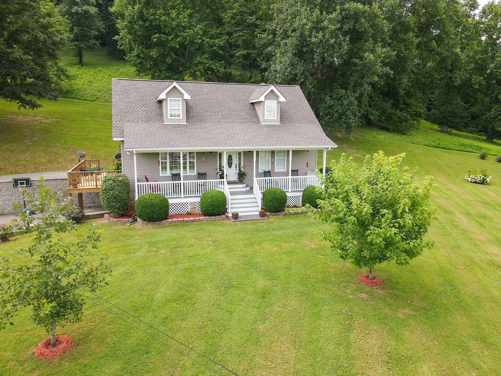 1914 Dr Robinson Rd Spring Hill Spring Hill, TN 37174 - Photo 1 of 44 a view of a house with garden and plants