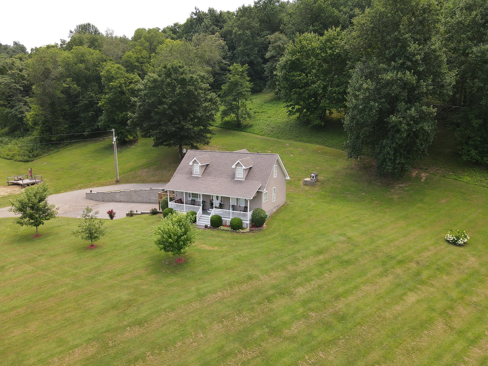 1914 Dr Robinson Rd Spring Hill Spring Hill, TN 37174 - Photo 4 of 44 an aerial view of a house with a yard basket ball court and outdoor seating