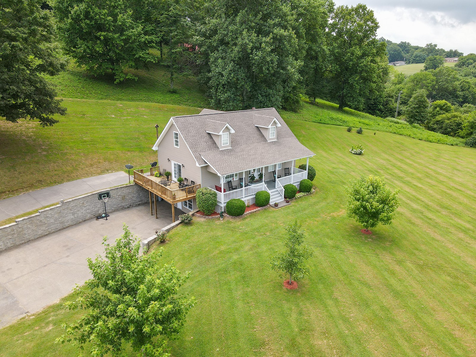 1914 Dr Robinson Rd Spring Hill Spring Hill, TN 37174 - Photo 5 of 44 an aerial view of a house with a garden and lake view