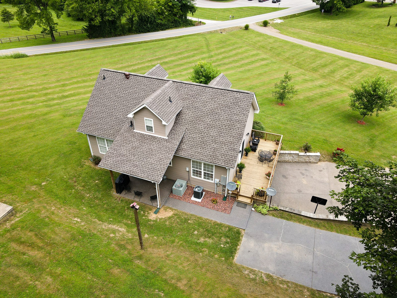 1914 Dr Robinson Rd Spring Hill Spring Hill, TN 37174 - Photo 7 of 44 a aerial view of a house with a garden and a table