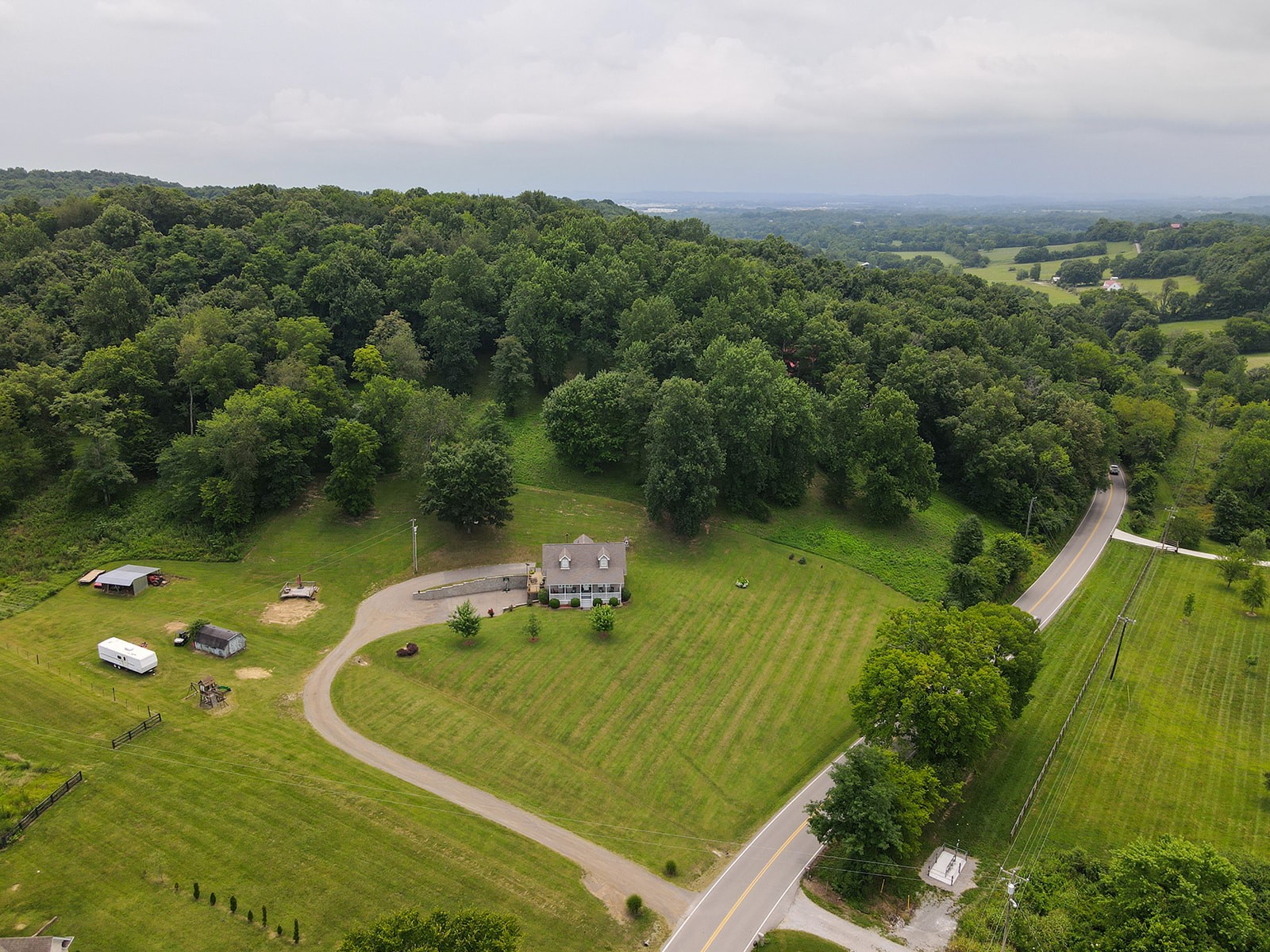 1914 Dr Robinson Rd Spring Hill Spring Hill, TN 37174 - Photo 8 of 44 an aerial view of a house with a yard