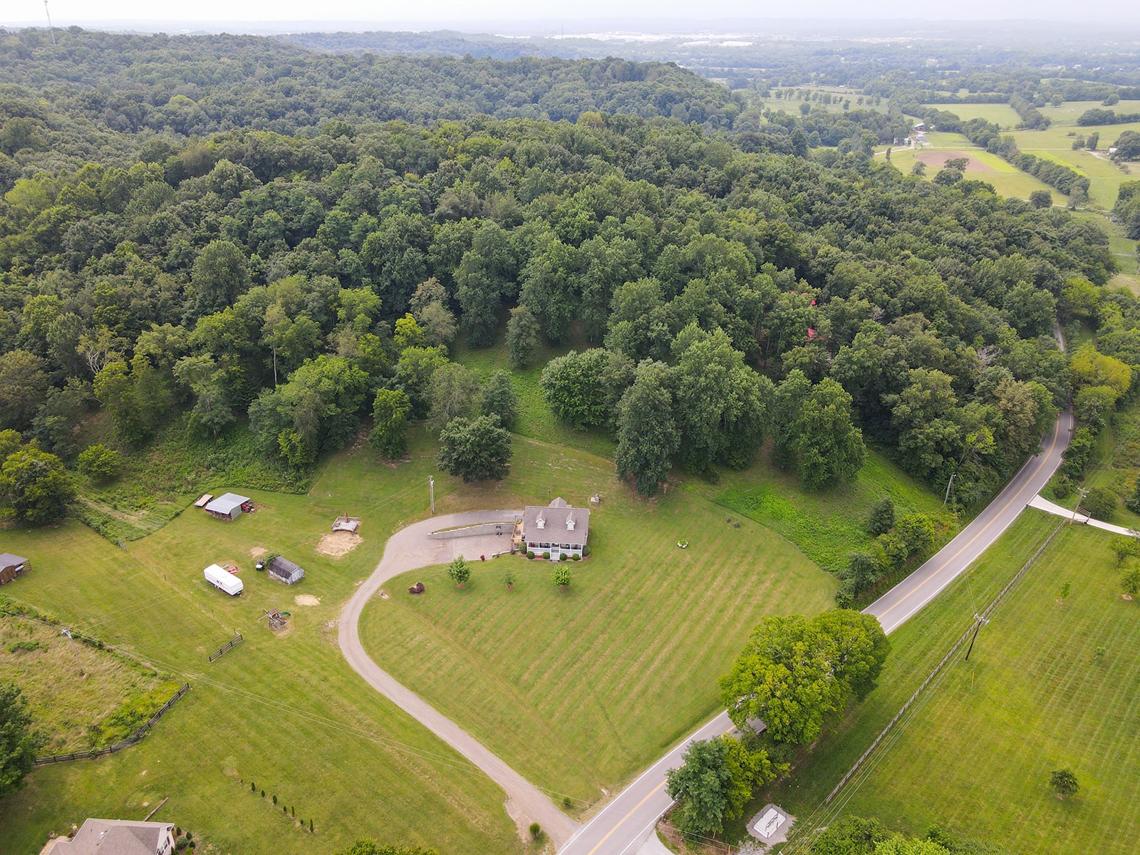 1914 Dr Robinson Rd Spring Hill Spring Hill, TN 37174 - Photo 10 of 44 a view of a lake with a yard