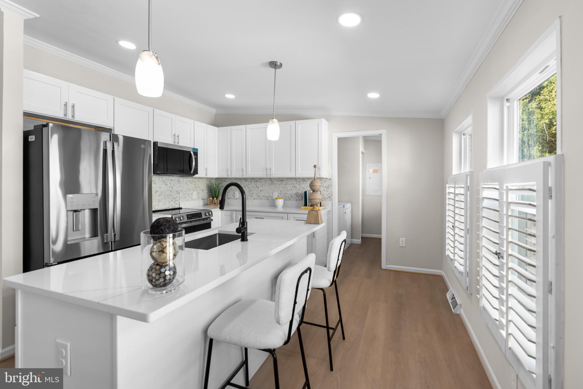 6430 Fourteenth Street Alexandria, VA 22307 - Photo 17 of 55 Modern kitchen with sleek finishes.