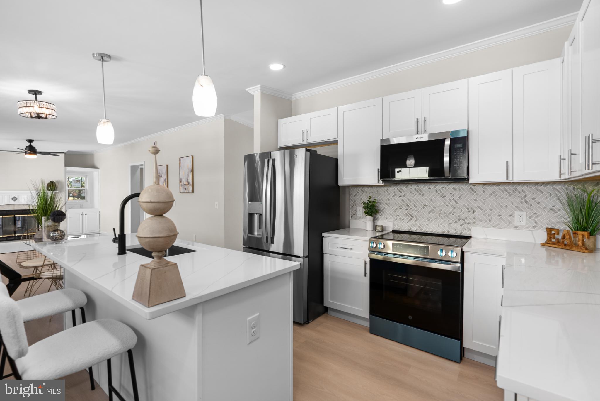 6430 Fourteenth Street Alexandria, VA 22307 - Photo 19 of 55 Modern kitchen with sleek finishes and style.