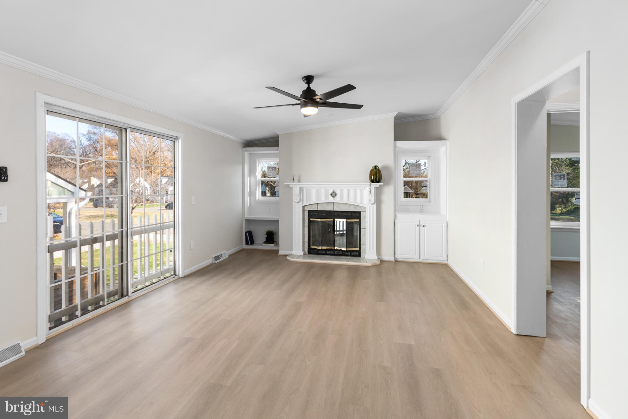 6430 Fourteenth Street Alexandria, VA 22307 - Photo 30 of 55 Bright and airy living space with fireplace.