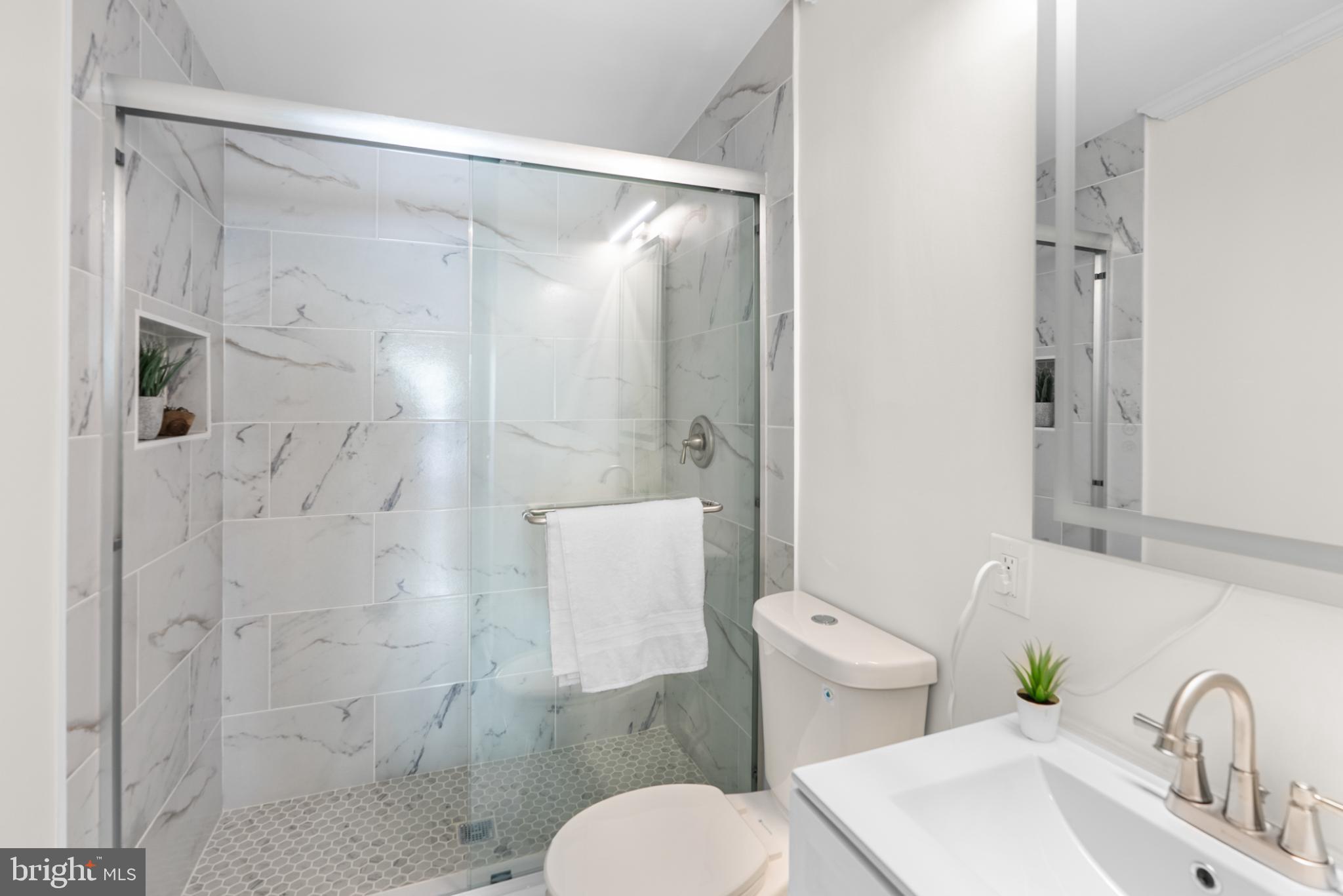 6430 Fourteenth Street Alexandria, VA 22307 - Photo 37 of 55 Modern bathroom with elegant finishes.