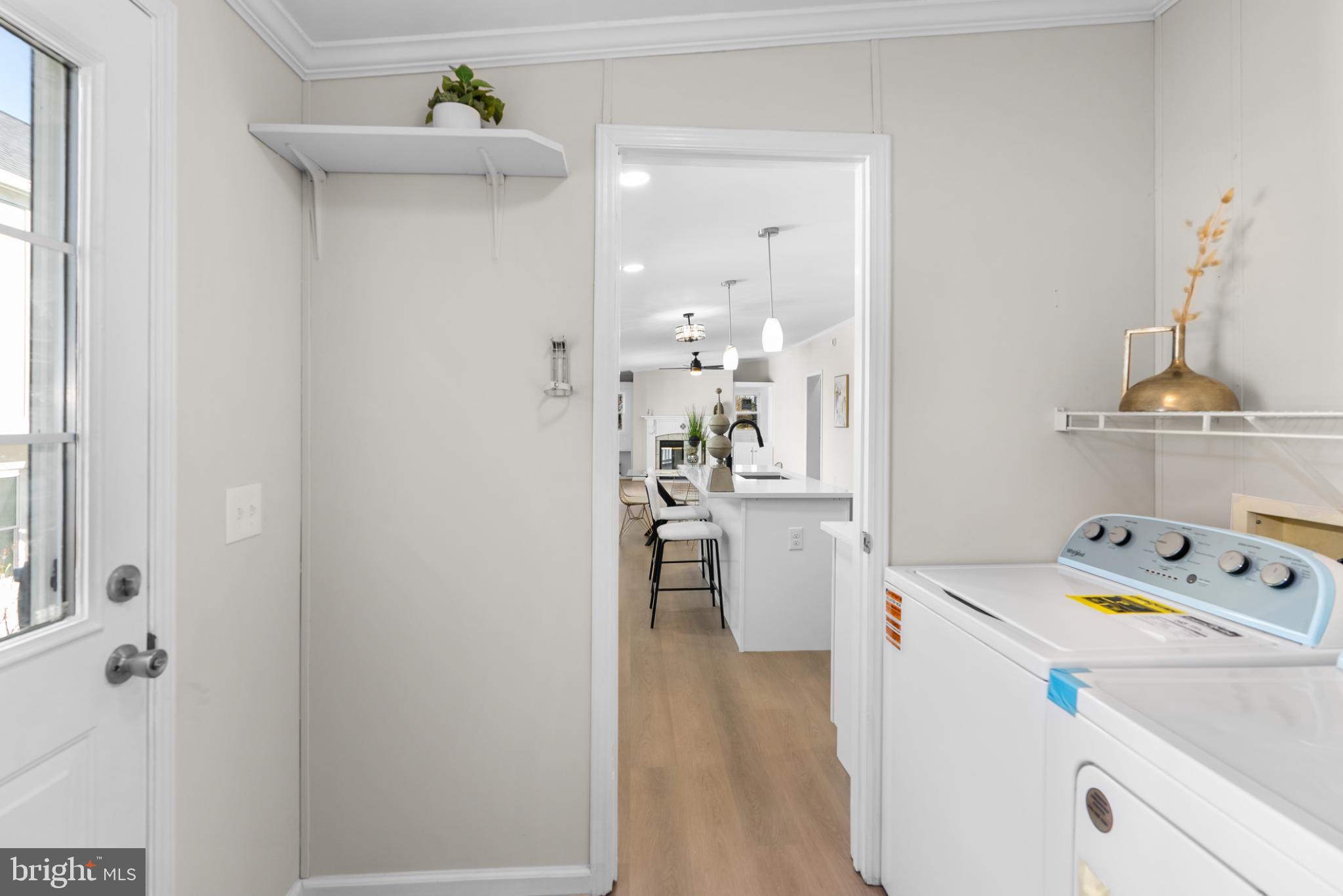 6430 Fourteenth Street Alexandria, VA 22307 - Photo 41 of 55 Bright and airy laundry entryway.
