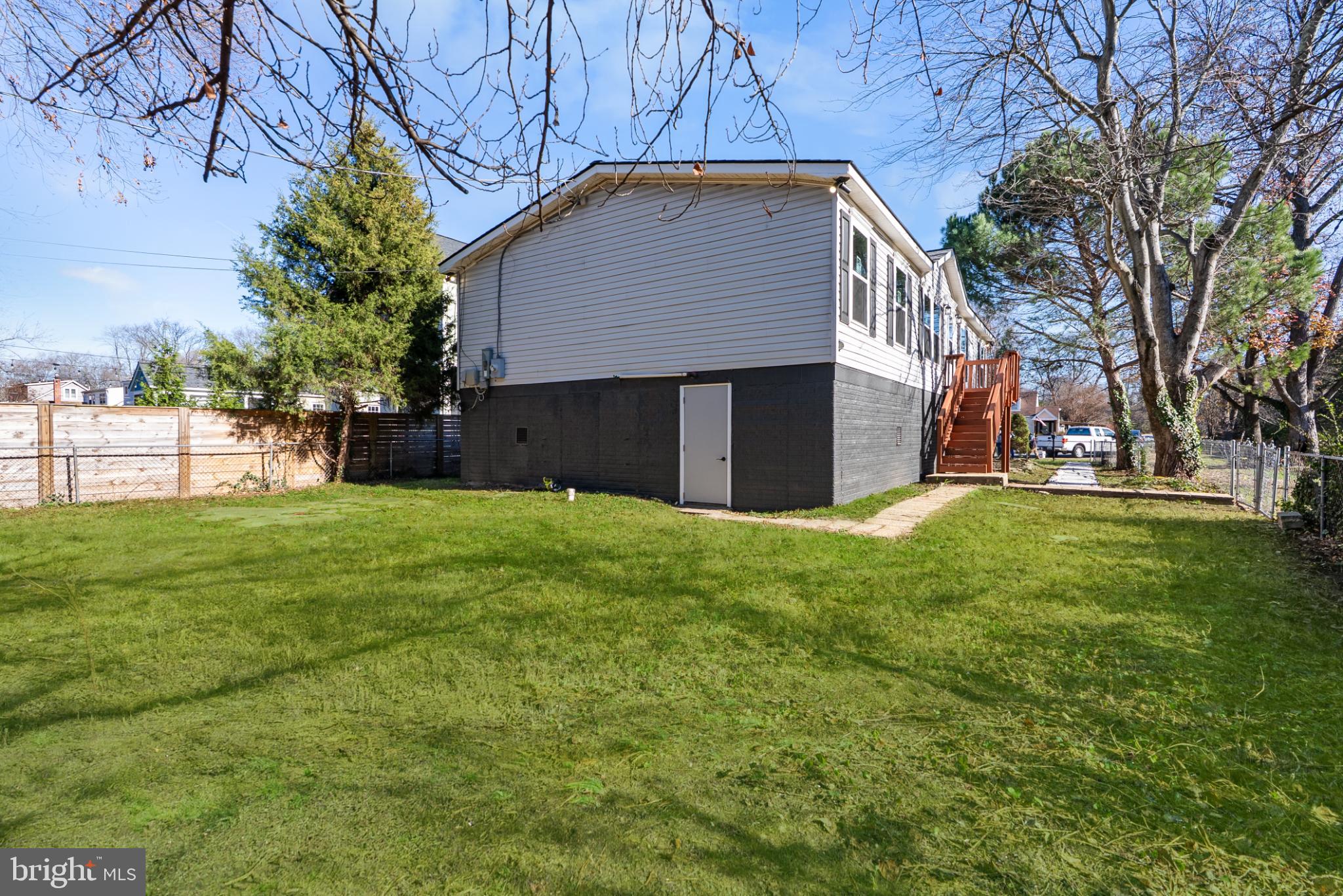 6430 Fourteenth Street Alexandria, VA 22307 - Photo 50 of 55 Spacious backyard with serene surroundings.