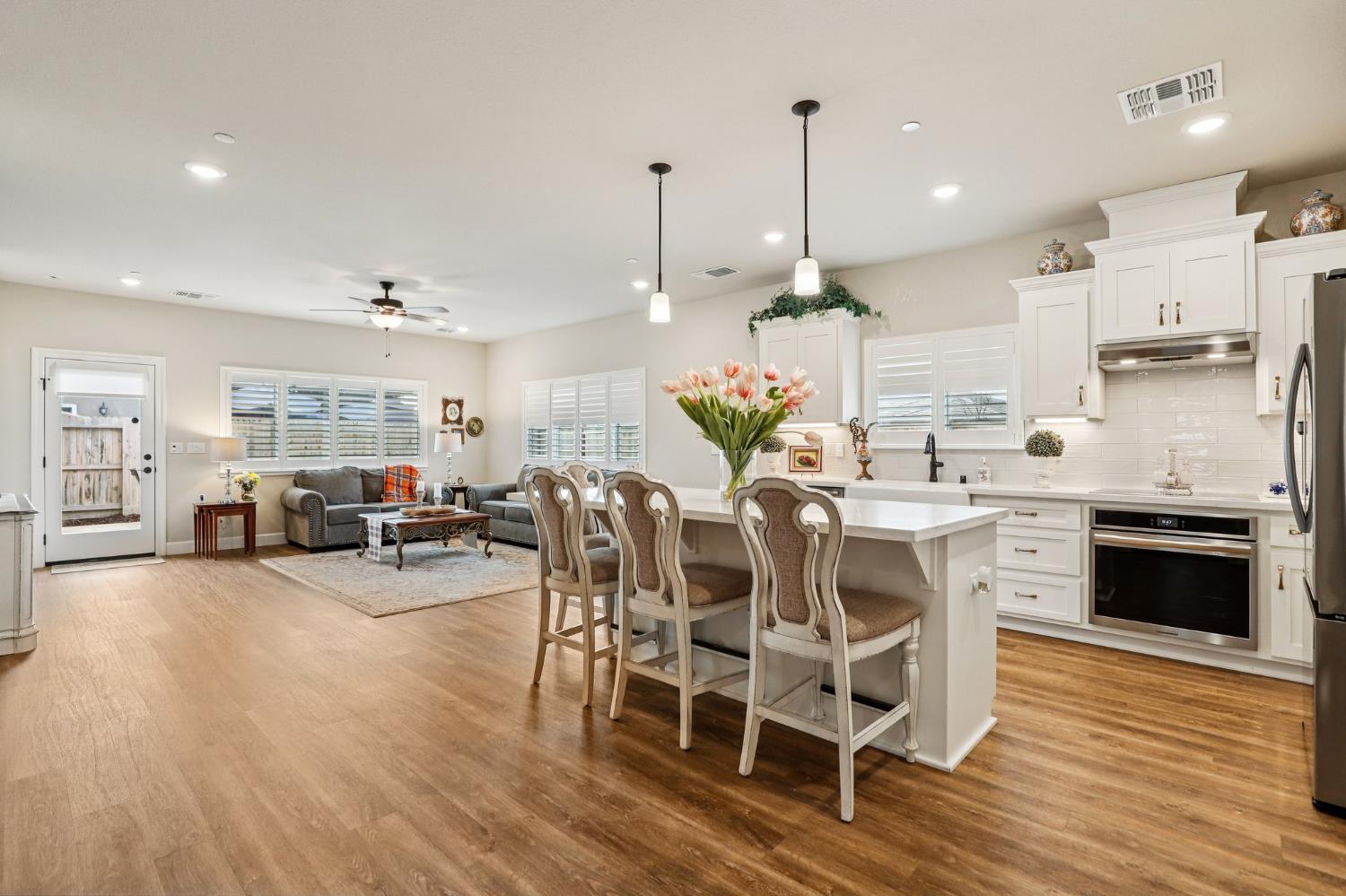 1124 North Palmer Road Galt, CA 95632 - Photo 13 of 41 a large kitchen with a table and chairs