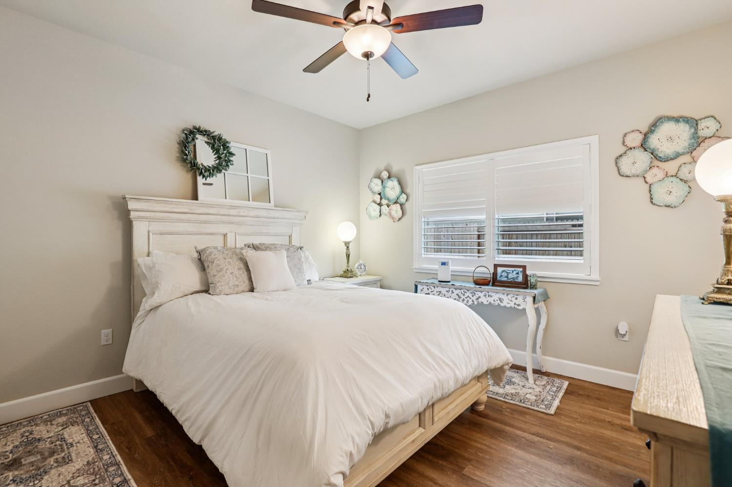 1124 North Palmer Road Galt, CA 95632 - Photo 17 of 41 a bedroom with a bed and window