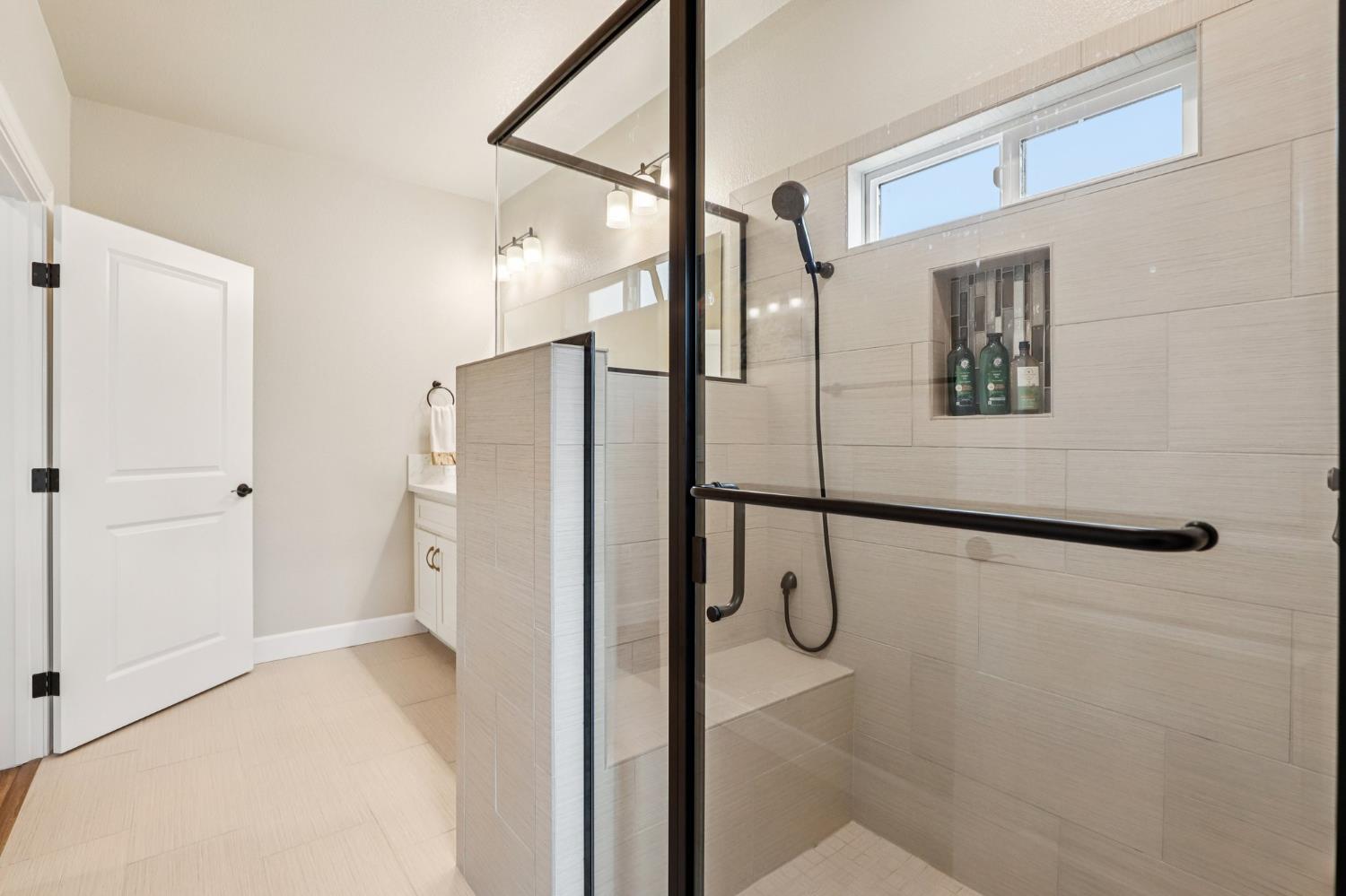 1124 North Palmer Road Galt, CA 95632 - Photo 24 of 41 a bathroom with a shower and a sink