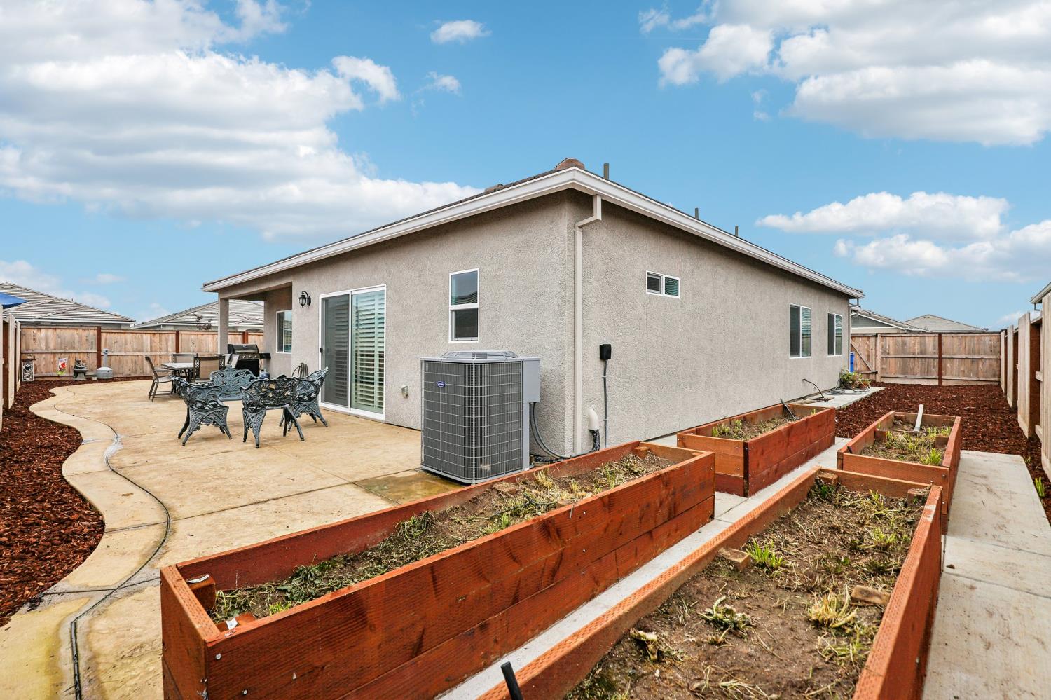 1124 North Palmer Road Galt, CA 95632 - Photo 34 of 41 a view of a dinning table and chairs in patio
