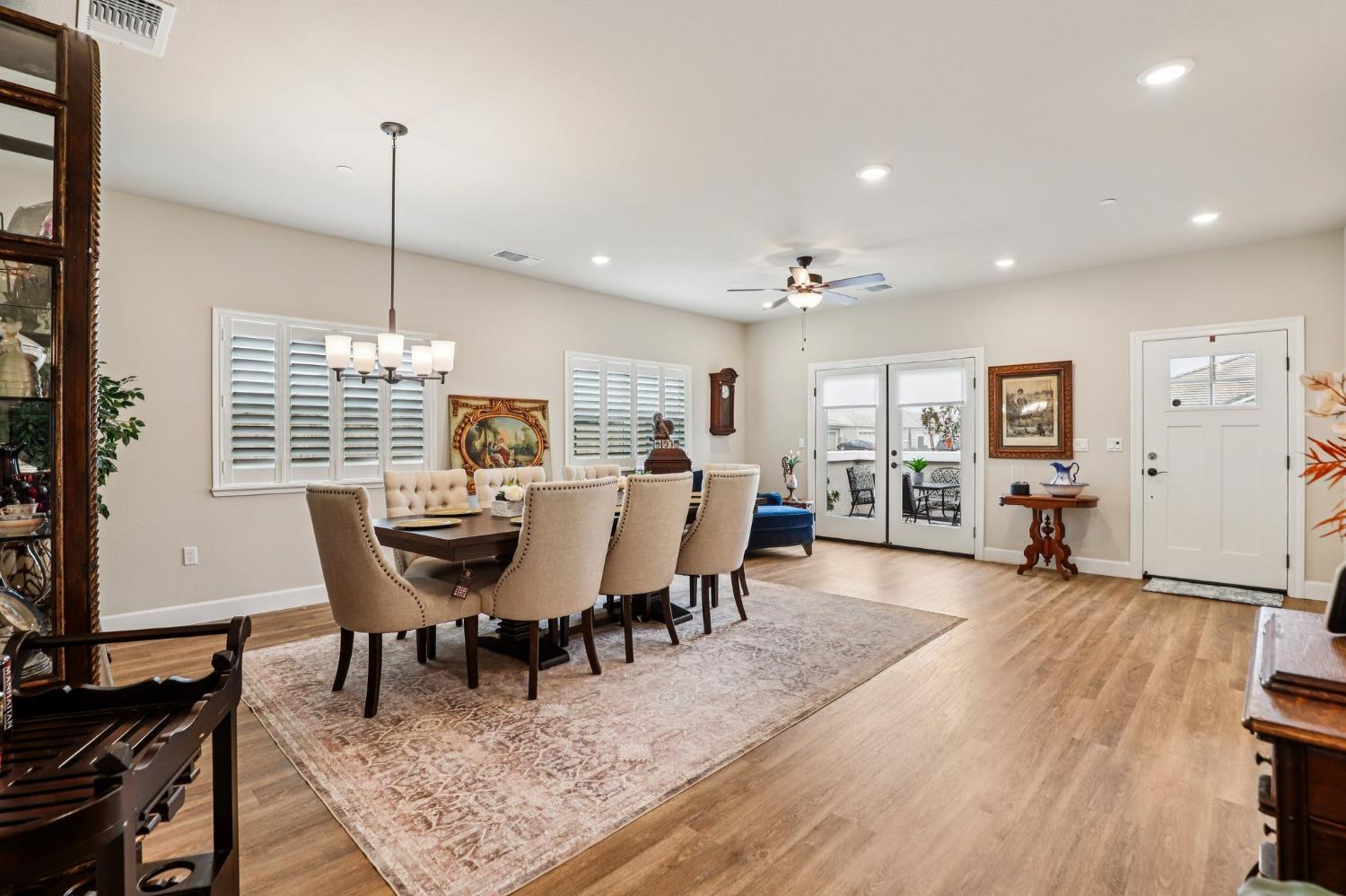 1124 North Palmer Road Galt, CA 95632 - Photo 7 of 41 a view of a dining room with furniture window and wooden floor