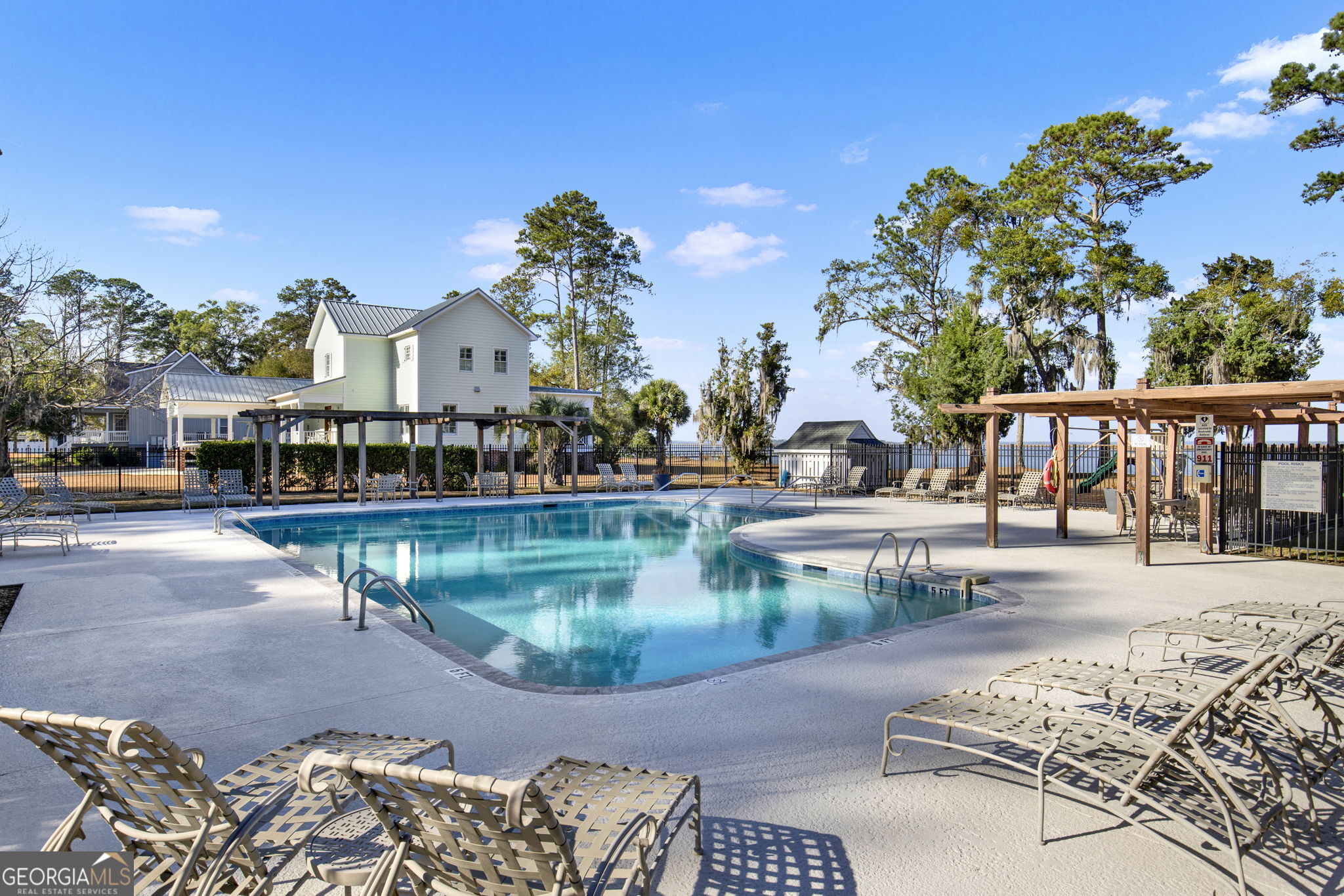 Lot 138 Sapelo Circle Townsend, GA 31331 - Photo 19 of 29 a view of swimming pool with a patio and a yard