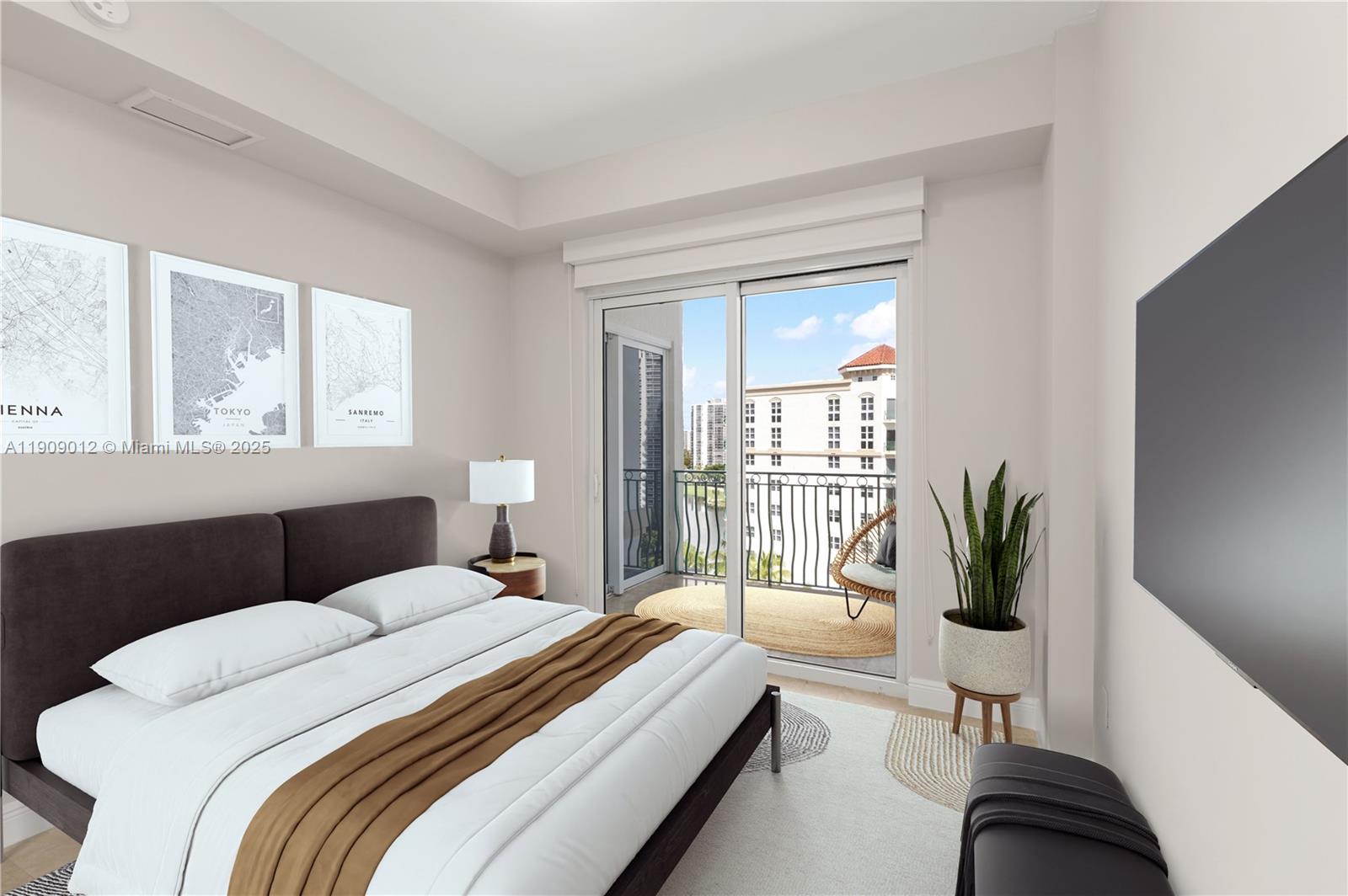 19900 East Country Club Drive, Unit PH18 Aventura, FL 33180 - Photo 18 of 45 a bedroom with a large bed and a potted plant