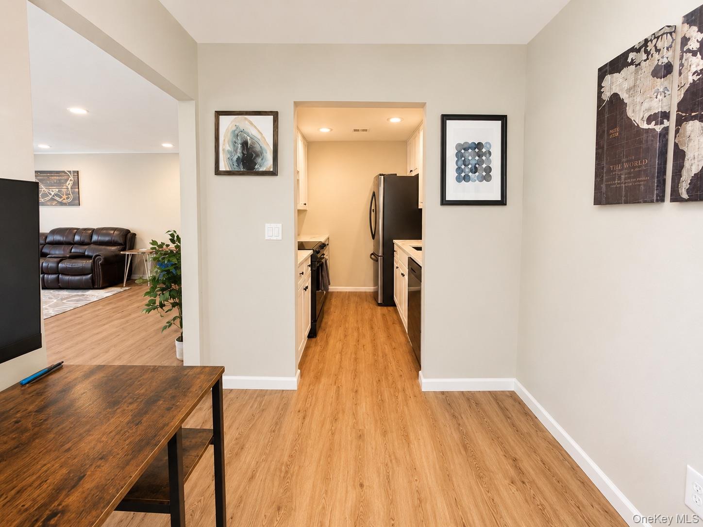 201 Birchwood Road, Unit 201 Coram, NY 11727 - Photo 4 of 27 a view of a living room and wooden floor