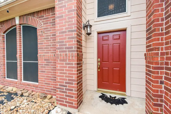 a front view of a house with a shower