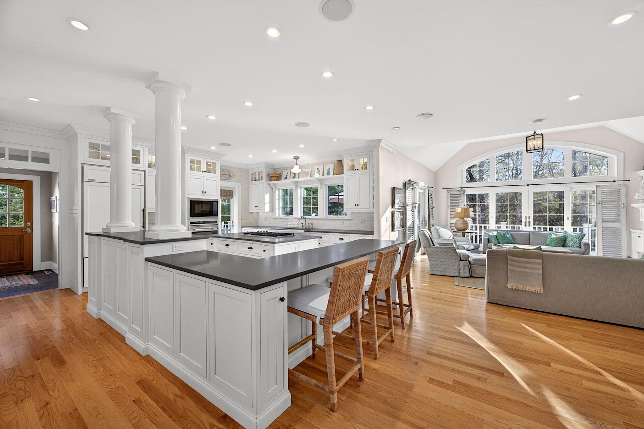 205 Little River Road Cotuit, MA 02635 - Photo 51 of 60 a kitchen with stainless steel appliances granite countertop a stove and a wooden floors