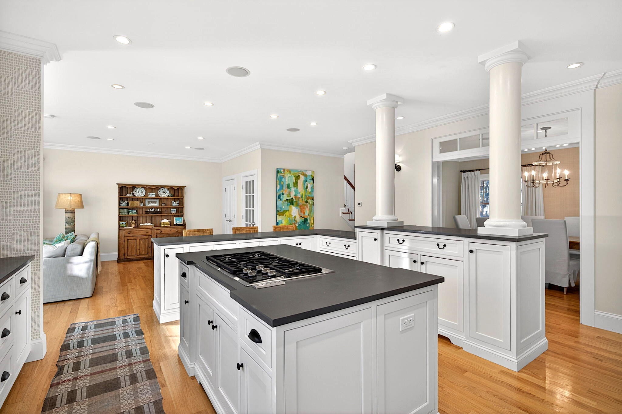 205 Little River Road Cotuit, MA 02635 - Photo 13 of 60 a kitchen with stainless steel appliances granite countertop a stove a sink and a refrigerator