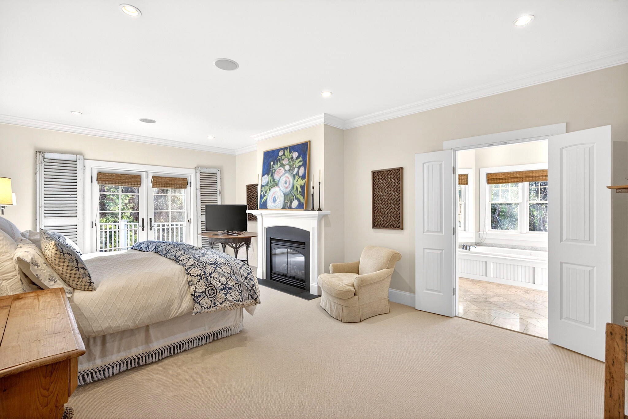 205 Little River Road Cotuit, MA 02635 - Photo 20 of 60 a bed room with a bed and a chair