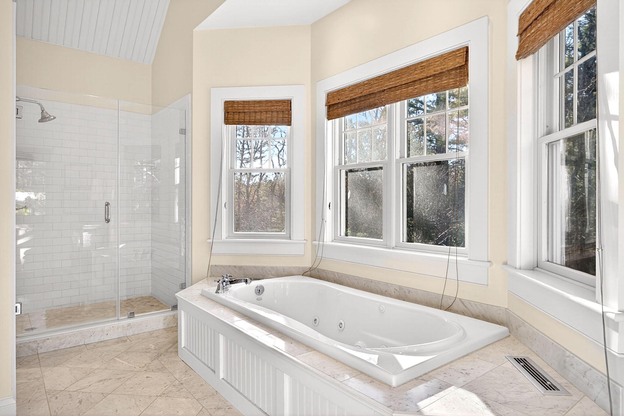 205 Little River Road Cotuit, MA 02635 - Photo 23 of 60 a bath tub sitting next to a window