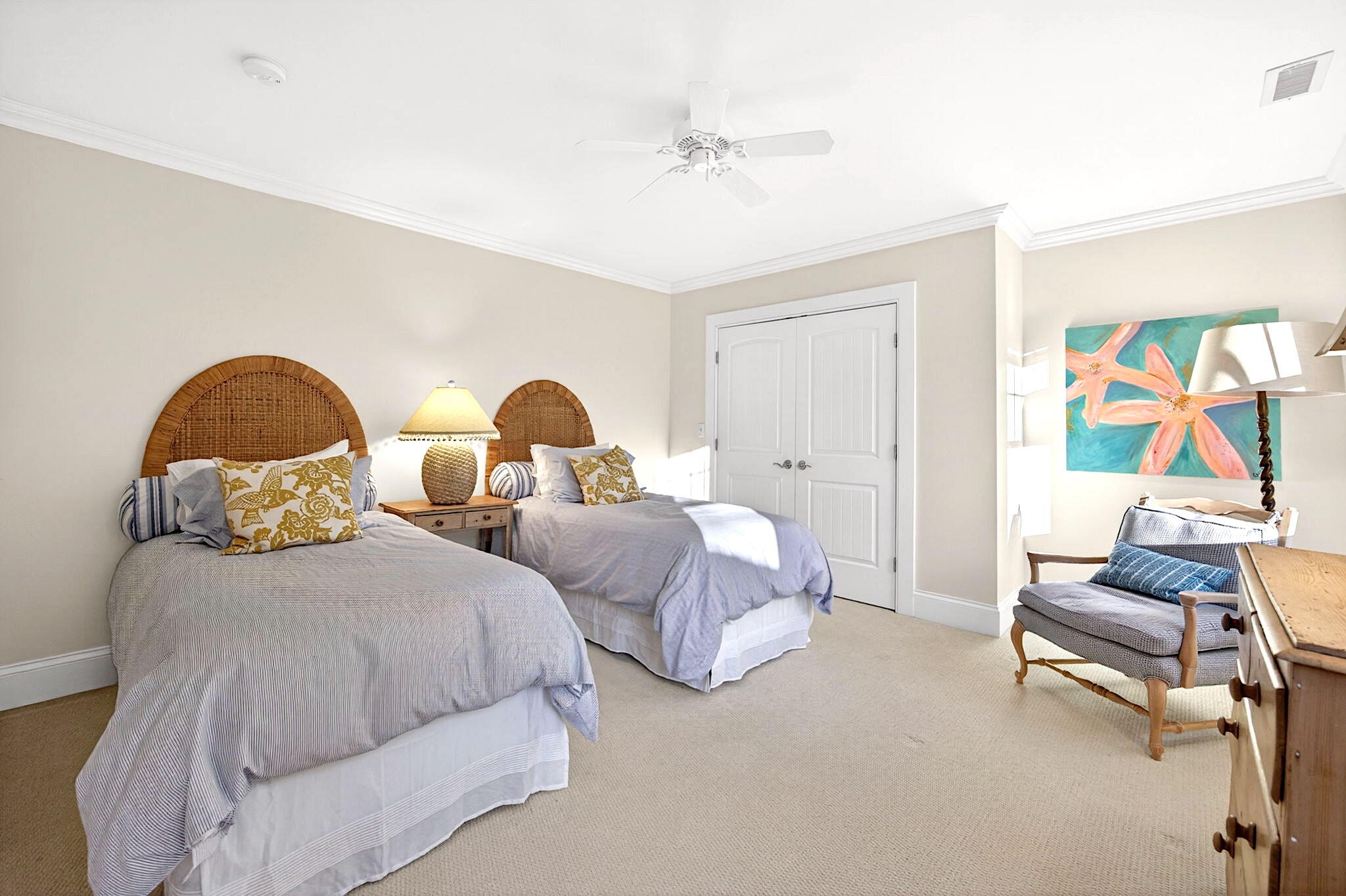 205 Little River Road Cotuit, MA 02635 - Photo 29 of 60 a bedroom with two beds and painting on the wall