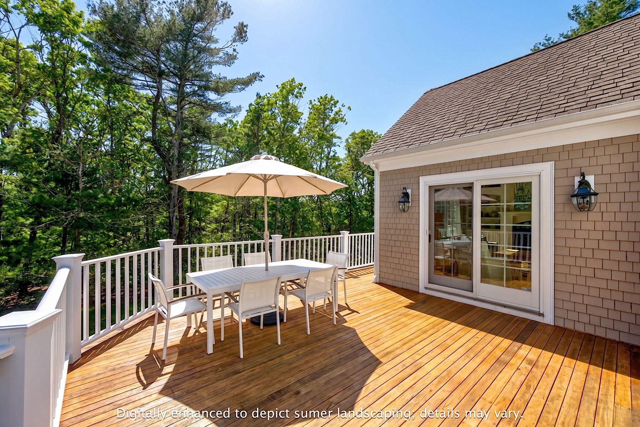 205 Little River Road Cotuit, MA 02635 - Photo 39 of 60 a view of a house with a porch and furniture