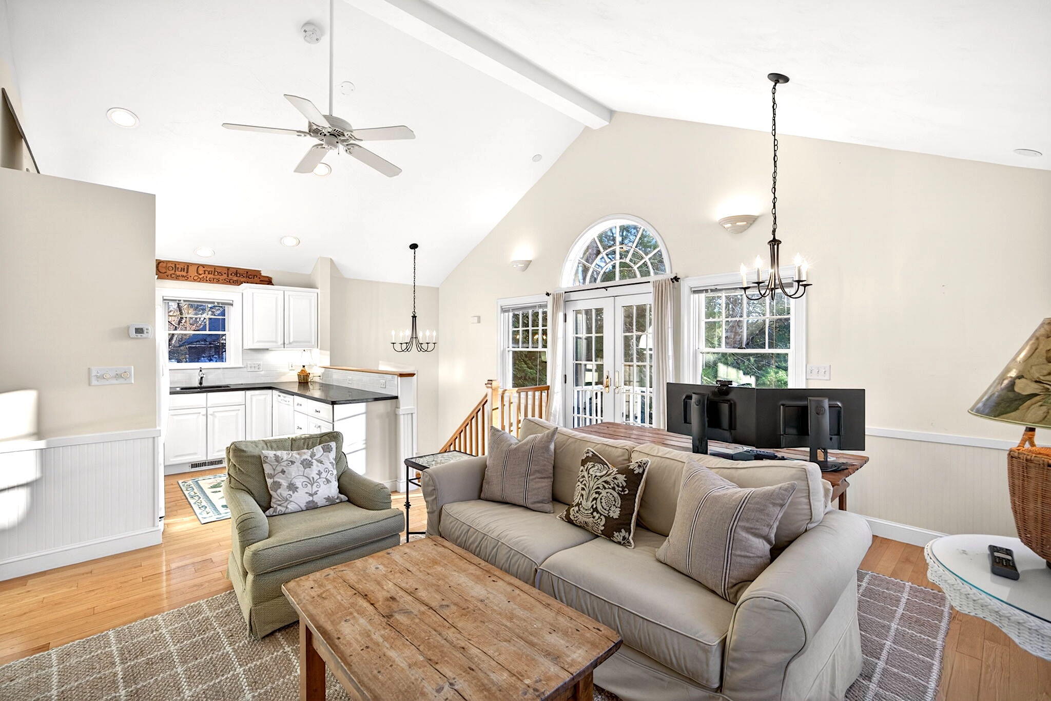 205 Little River Road Cotuit, MA 02635 - Photo 53 of 60 a living room with furniture a ceiling fan and a window