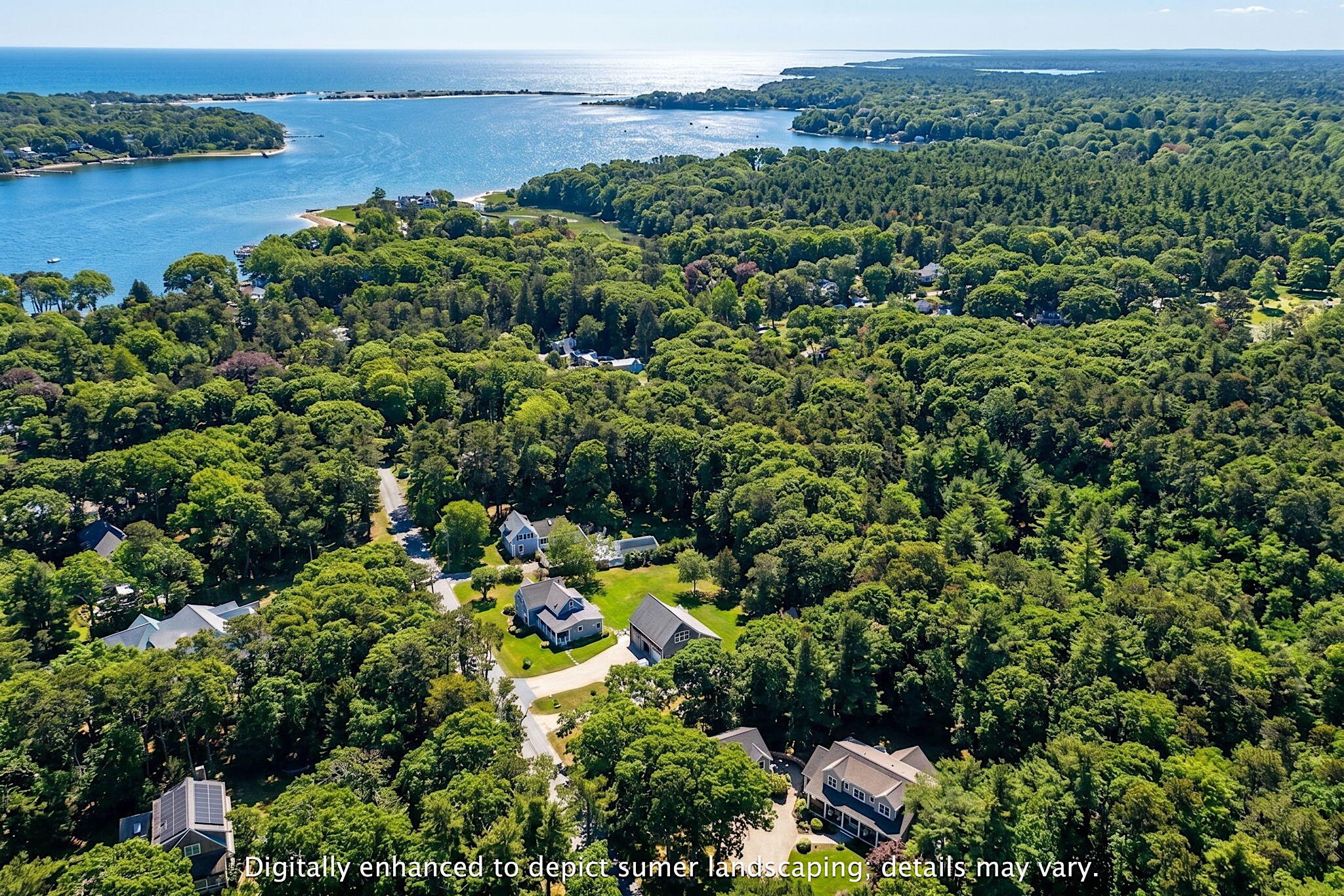 205 Little River Road Cotuit, MA 02635 - Photo 5 of 60 an aerial view of a houses with a lake view