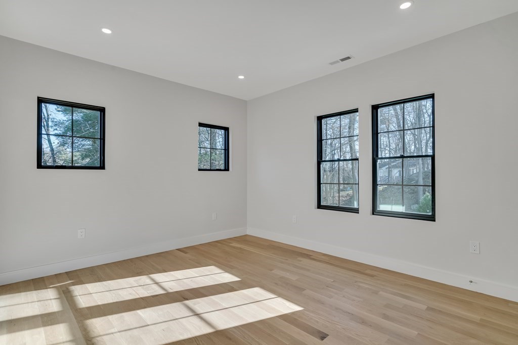 37 Preston Road Lexington, MA 02420 - Photo 17 of 27 a view of an empty room with a window