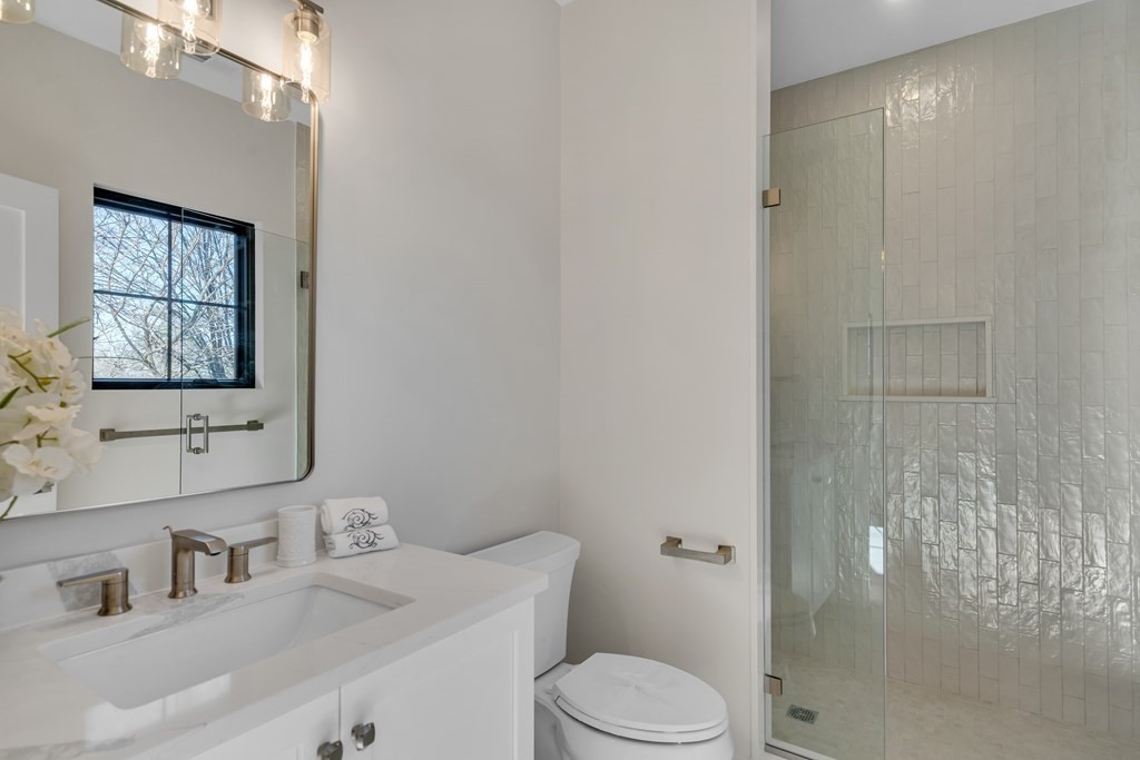 37 Preston Road Lexington, MA 02420 - Photo 18 of 27 a bathroom with a sink toilet and shower