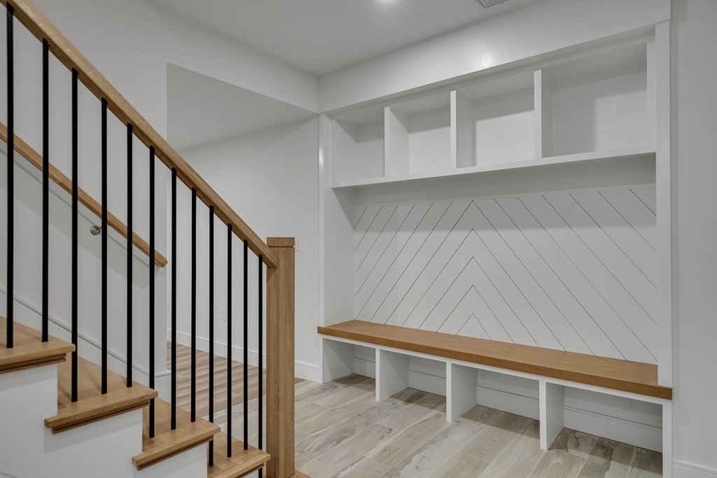 37 Preston Road Lexington, MA 02420 - Photo 19 of 27 a view of a hallway with staircase