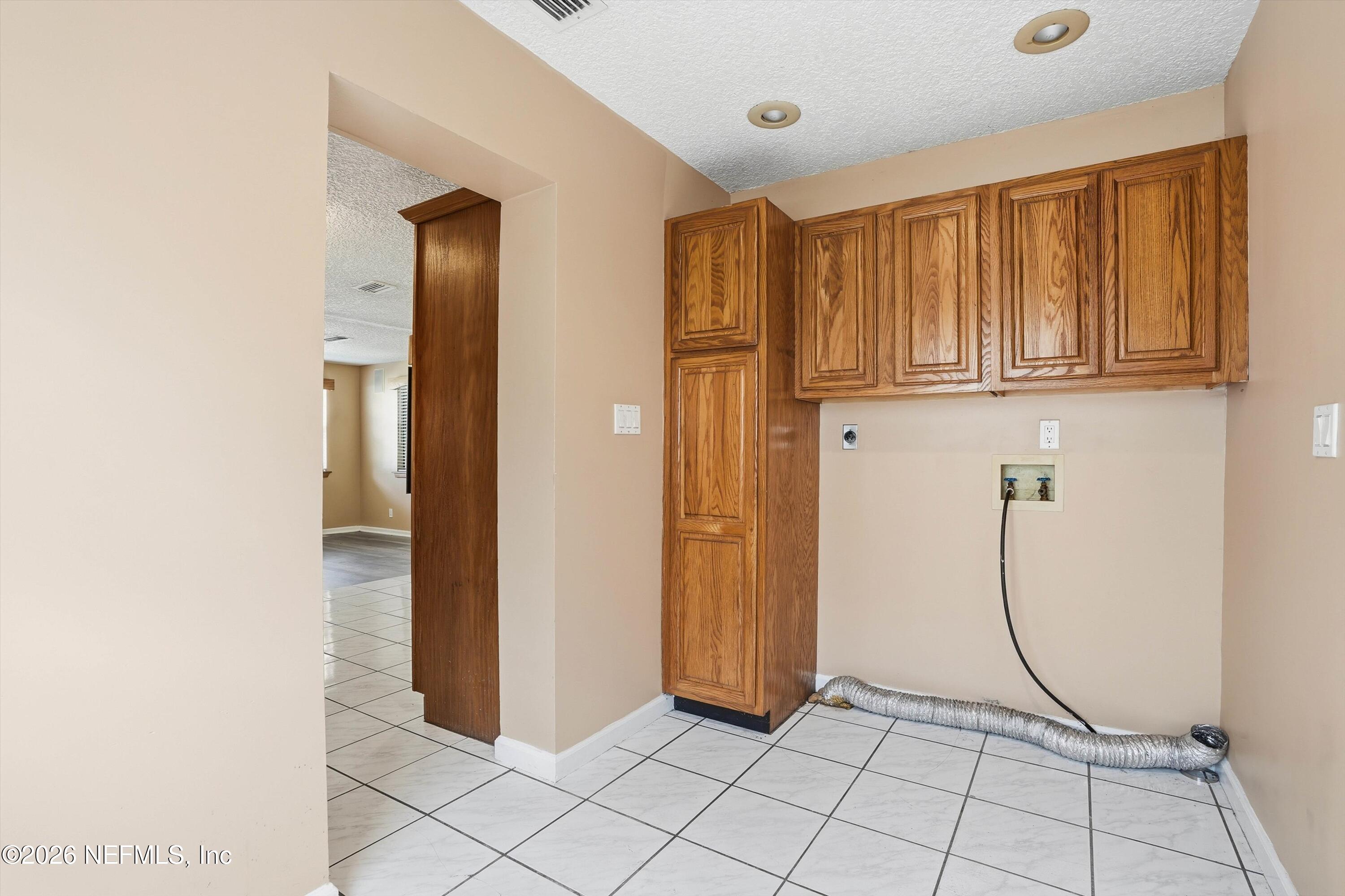 1736 Lakewood Road Jacksonville, FL 32207 - Photo 13 of 31 a view of an entryway with wooden floor