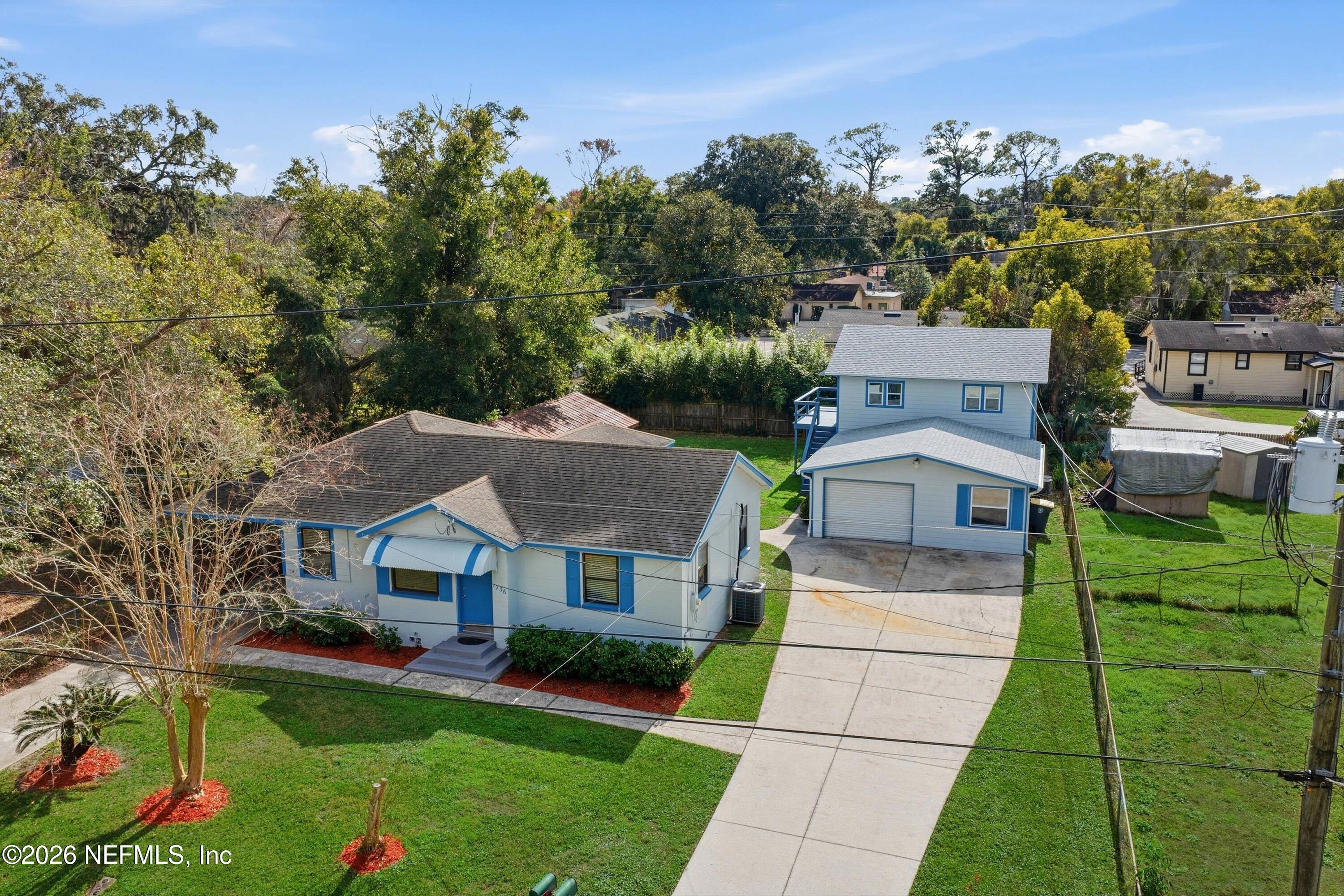 1736 Lakewood Road Jacksonville, FL 32207 - Photo 27 of 31 an aerial view of a house with a garden