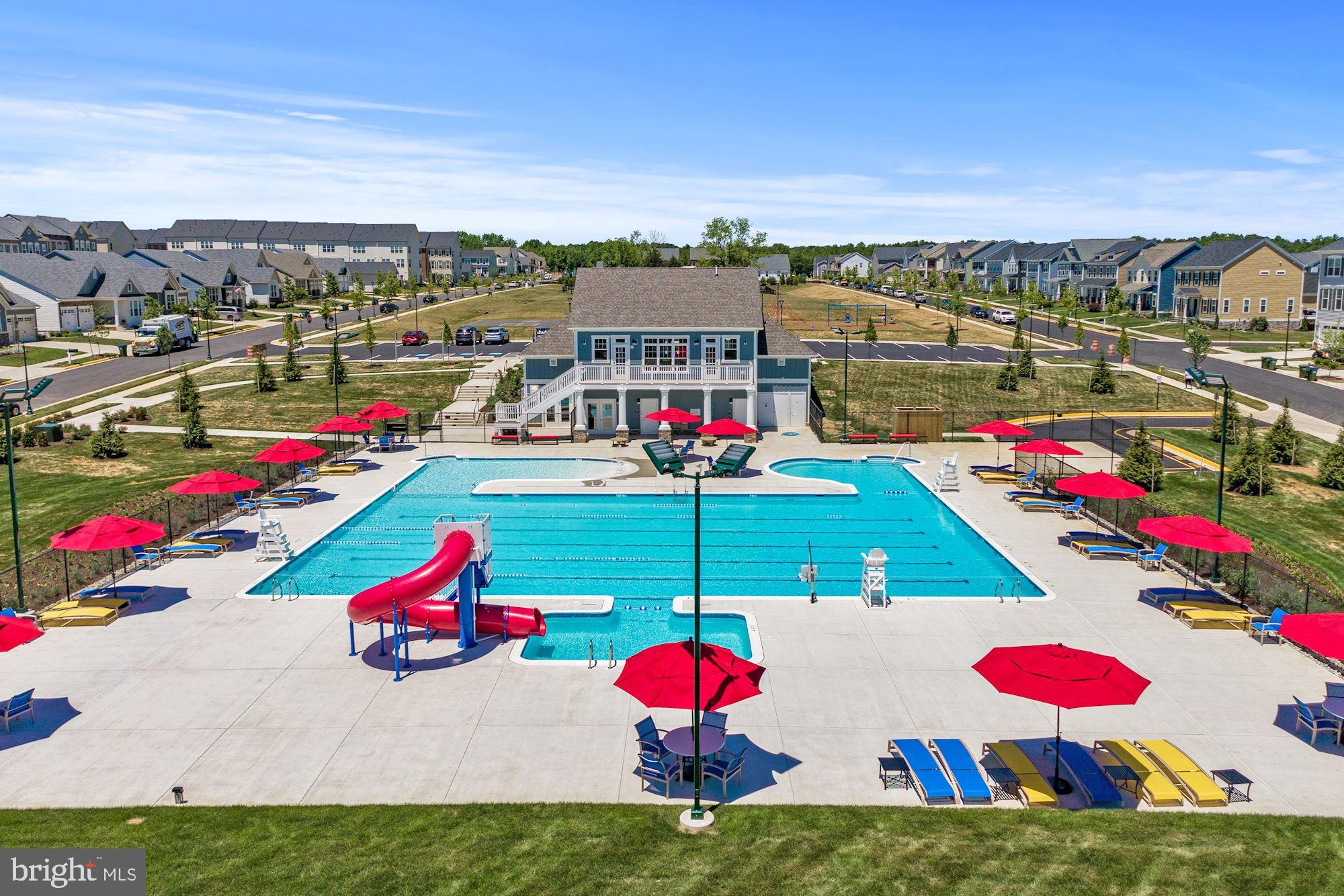 76 Valerian Loop, Unit 2 Stafford, VA 22554 - Photo 15 of 43 a view of a rooftop deck with dining table and chairs