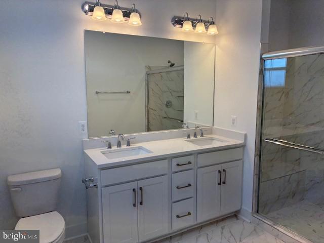 76 Valerian Loop, Unit 2 Stafford, VA 22554 - Photo 7 of 43 a bathroom with a granite countertop sink mirror and toilet