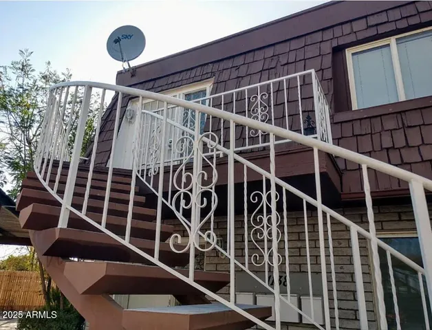 a bathroom with a sink and mirror