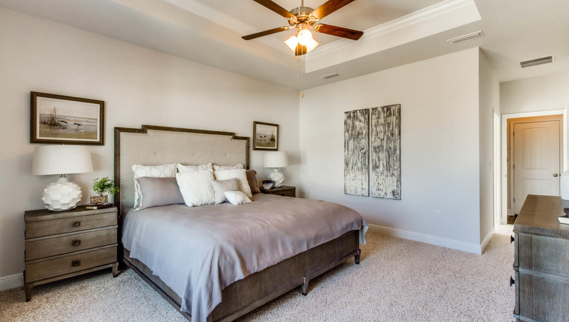 35 Krewe Circle, Unit LOT 15 Santa Rosa Beach, FL 32459 - Photo 12 of 23 a bedroom with a bed and a chandelier