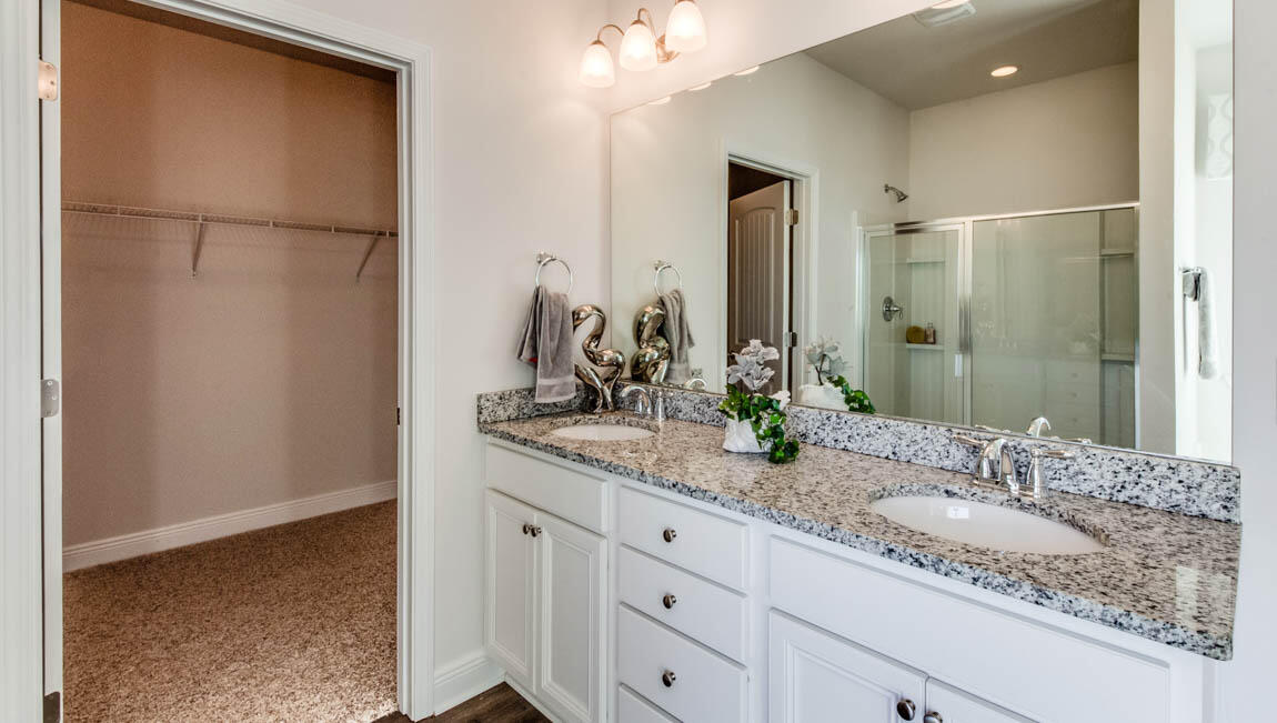 35 Krewe Circle, Unit LOT 15 Santa Rosa Beach, FL 32459 - Photo 14 of 23 a bathroom with a double vanity sink and a mirror