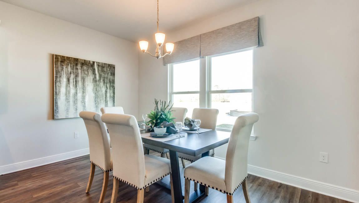 35 Krewe Circle, Unit LOT 15 Santa Rosa Beach, FL 32459 - Photo 10 of 23 a view of a dining room with furniture window and wooden floor